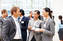 Business people chatting at a conference